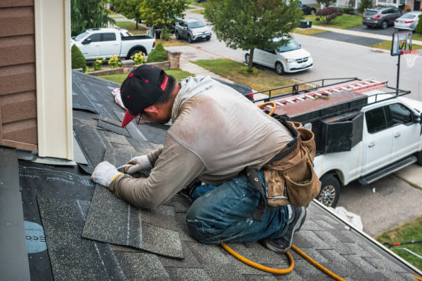 Professional Hail Damage Roof Repair technician working in Fort George G Meade, MD